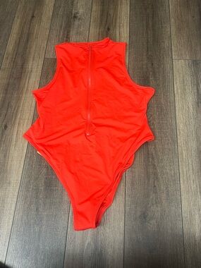 Skims zip up swim